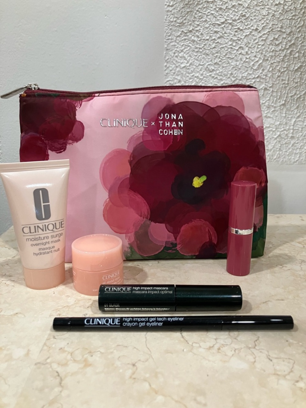 CLINIQUE JONATHAN COHEN MAKE UP BAG, EYELINER, MASCARA, LIPSTICK, MOISTURE MASK